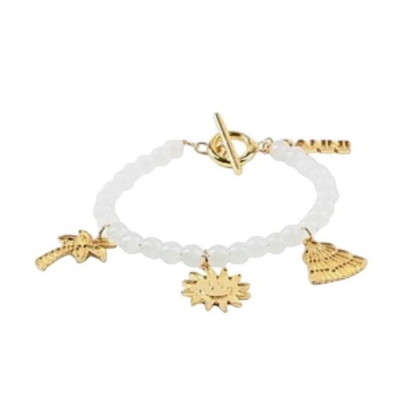 Ganni Jewelry - Ganni White beaded bracelet with gold charms